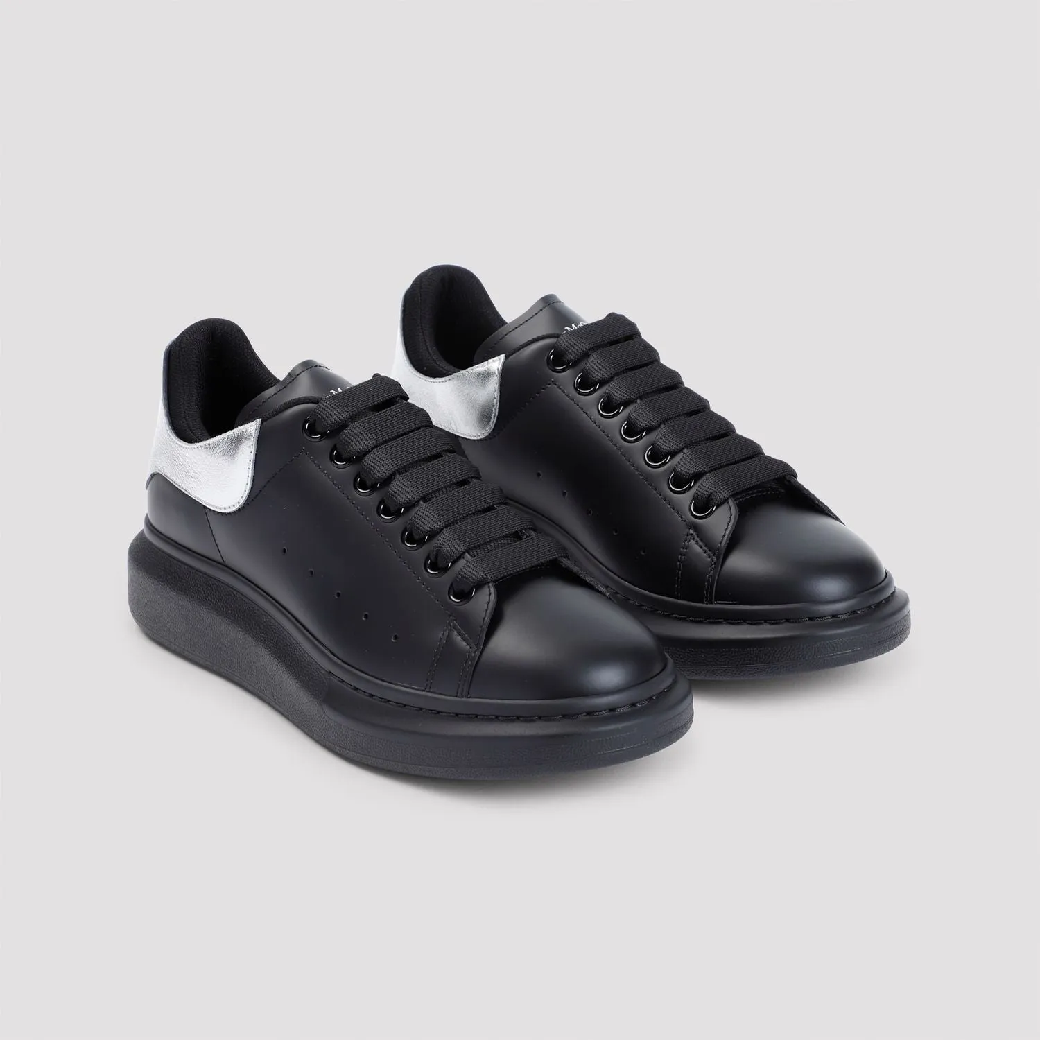 ALEXANDER MCQUEEN Elevated All-Black Leather Sneakers