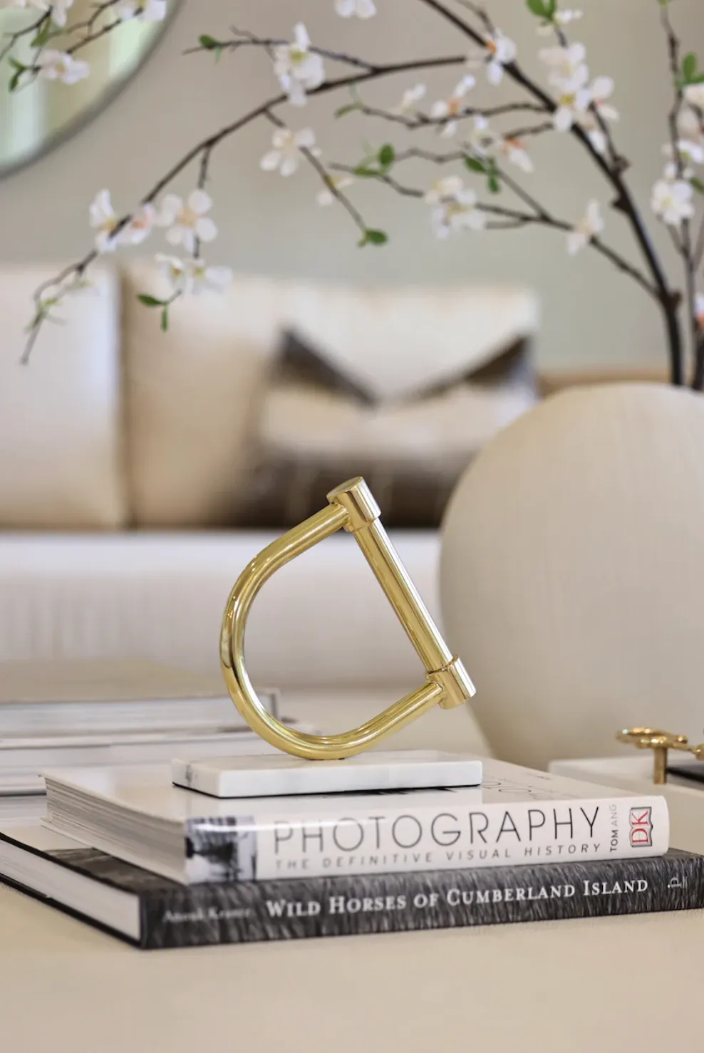 Stirrup Decor Golden brass with  white Marble stand.