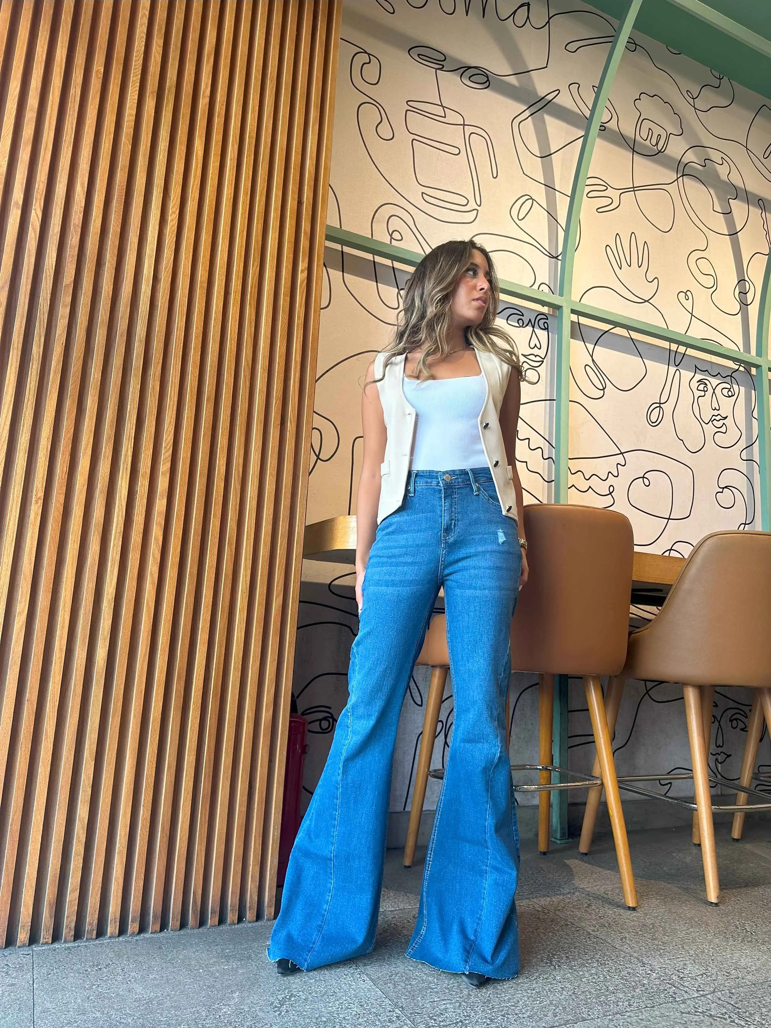 Super Flared - Mid Blue Wash High-Waisted Jeans.