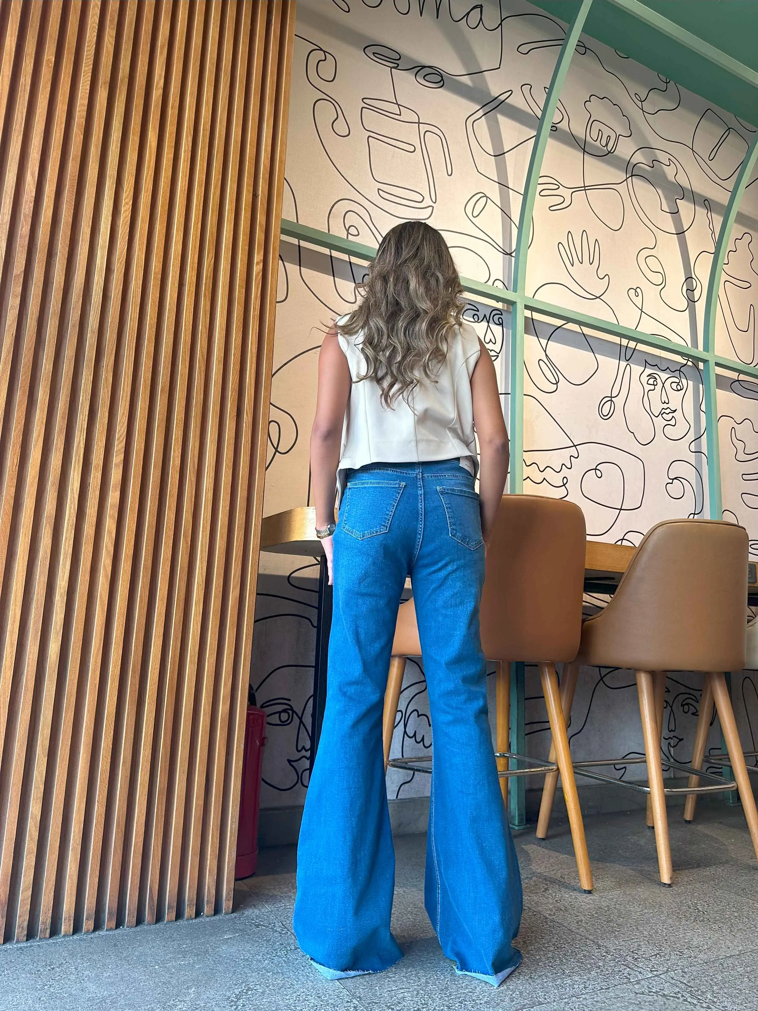 Super Flared - Mid Blue Wash High-Waisted Jeans.