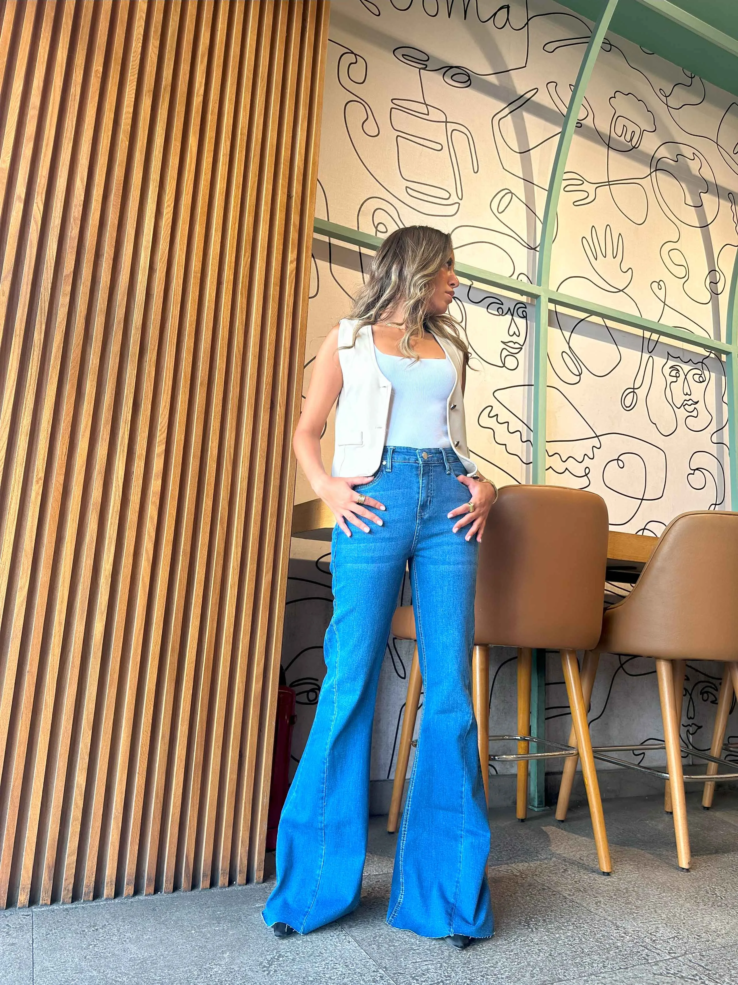 Super Flared - Mid Blue Wash High-Waisted Jeans.