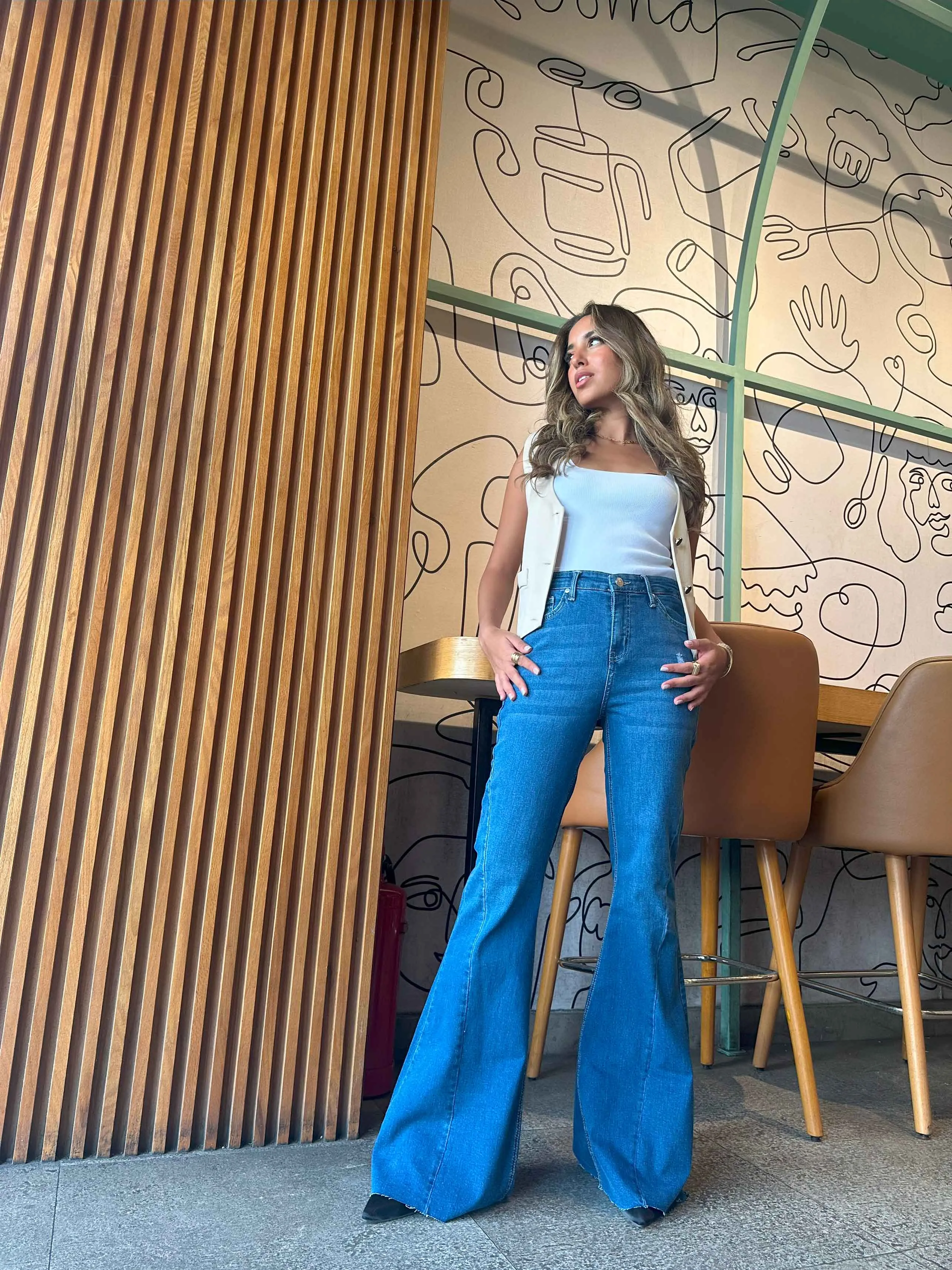 Super Flared - Mid Blue Wash High-Waisted Jeans.