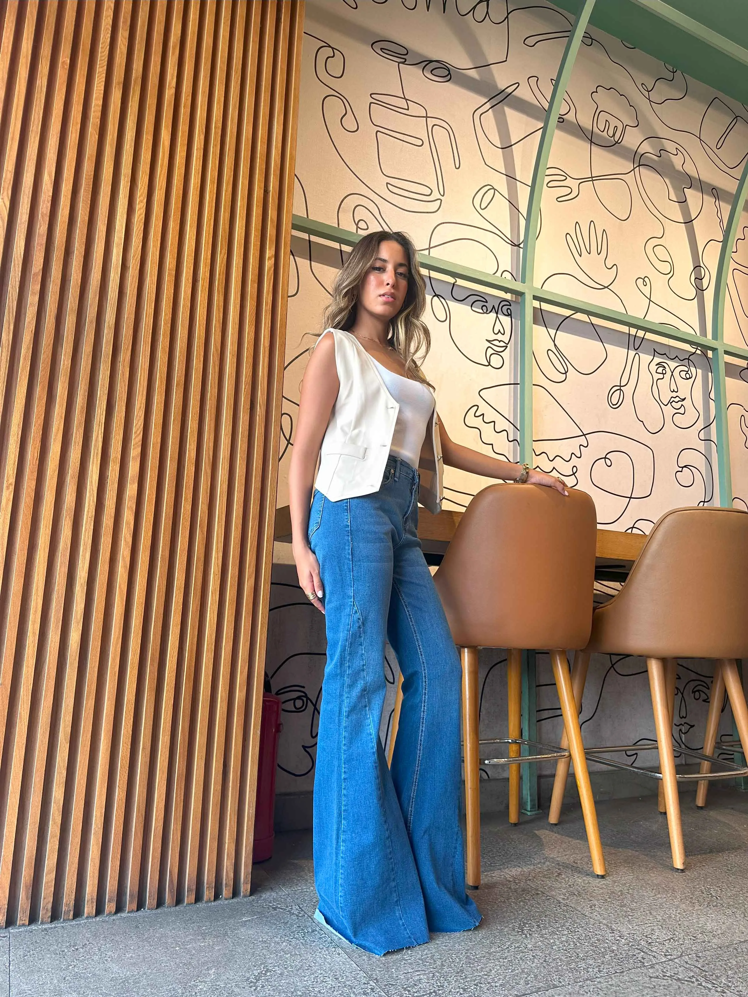 Super Flared - Mid Blue Wash High-Waisted Jeans.